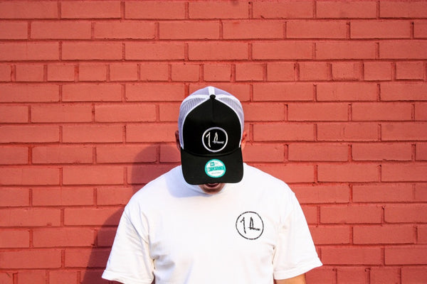 Black/White Original Logo Patch Trucker Hat